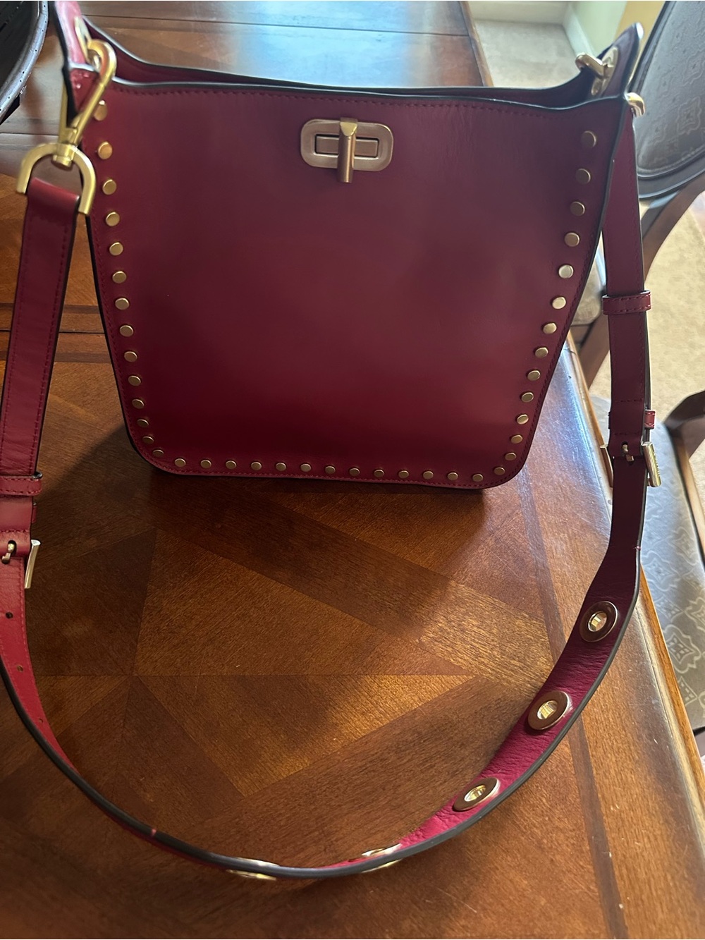 MICHAEL KORS brass Stud-Trim Crossbody Bag in Deep Red with adjustable strap